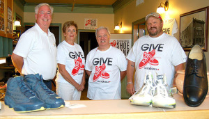 (From left) Fraser Campbell, chairperson on the Kelowna Community Food Bank's board of directors, Donna Mayer, shoe bank coordinator, Jim Belshaw, chair of Soles4Souls Canada and Steve Goddard, member of Soles4Souls Canada's board of director, are part of the team that has made the Kelowna Sunrise Rotary Shoe Bank possible.